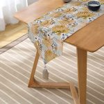 - UcgenRunner-5347-Gorsel2 - Realhomes  Tropik Gold Yapraklar Üzerinde Antik Yunan Tanrısı Desenli Püsküllü Şönil Üçgen Runner Realhomes