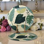 - Supla2li-7245-Gorsel1 - Realhomes  Realhomes Soft Renkli Zemin Üzerinde Koyu Renkli Yaprak Desenli 2'li Yuvarlak Servis Altlığı - Supla Realhomes