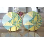 Realhomes Renkli Zemin Üzerinde Geometrik Desenli Yaprak Motifli 2'li Yuvarlak Servis Altlığı - Supla Realhomes