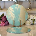 - Supla2li-7976-Gorsel1 - Realhomes  Realhomes Pastel Zemin Üzerinde Gold Detaylı Yaprak Desenli Modern 2'li Yuvarlak Servis Altlığı - Supla Realhomes