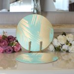 - Supla2li-7976-Gorsel3 - Realhomes  Realhomes Pastel Zemin Üzerinde Gold Detaylı Yaprak Desenli Modern 2'li Yuvarlak Servis Altlığı - Supla Realhomes