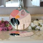 - Supla2li-8127-Gorsel3 - Realhomes Realhomes Pastel Zemin Üzerinde Geometrik Çizimli Çiçek Motifli 2'li Yuvarlak Servis Altlığı - Supla Realhomes