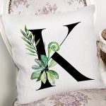 - Rh-K9466-Gorsel2 - Realhomes Beyaz Zemin Yaprak Motifli Siyah K Harfi Özel Tasarım Dijital Baskılı Yastık Kırlent Kılıfı Realhomes