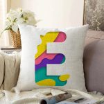 - Sonil-K9501-Gorsel1 - Realhomes Beyaz Zemin Renkli E Harfli Özel Tasarım Dijital Baskılı Raşel Kadife Yastık Kırlent Kılıfı Realhomes