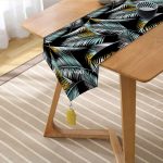 - UcgenRunner-7303-Gorsel2 - Realhomes  Realhomes Siyah Zemin Üzerinde Yaprak Desenli Dijital Baskılı Özel Tasarım Püsküllü Şönil Üçgen Runner Realhomes