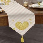 - UcgenRunner-8239-Gorsel1 - Realhomes Realhomes Beyaz Zeminli Pembe Yatay Çizgili Gold Detaylı Kalp Desenli Özel Tasarım Püsküllü Şönil Üçgen Runner Realhomes