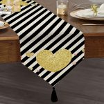 - UcgenRunner-8241-Gorsel1 - Realhomes Realhomes Beyaz Zeminli Siyah Yatay Çizgili Gold Detaylı Kalp Desenli Özel Tasarım Püsküllü Şönil Üçgen Runner Realhomes