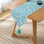 - UcgenRunner-8395-Gorsel2 - Realhomes  Realhomes Renkli Zemin Üzerinde Yılbaşı Desenli Dijital Baskılı Özel Tasarım Püsküllü Şönil Üçgen Runner Realhomes