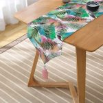 - UcgenRunner-8560-Gorsel2 - Realhomes Realhomes Beyaz Zemin Üzerinde Renkli Soyut Çizimli Yaprak Desenli Dijital Baskılı Özel Tasarım Püsküllü Şönil Üçgen Runner Realhomes