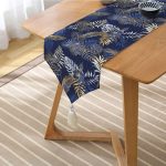 - UcgenRunner-8573-Gorsel2 - Realhomes Realhomes Mavi Zemin Üzerinde Gold Detaylı Yaprak Desenli Dijital Baskılı Özel Tasarım Püsküllü Şönil Üçgen Runner Realhomes