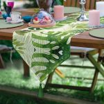 - UcgenRunner-3336-Gorsel - Realhomes Ekru Zeminde Amazon Yaprakları Özel Tasarım Püsküllü Şönil Üçgen Runner Realhomes