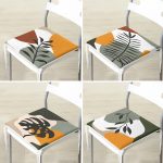 4'lü Beyaz Zemin Üzerinde Renkli Yaprak Desenli Modern Fermuarlı Sandalye Minderi Seti Realhomes