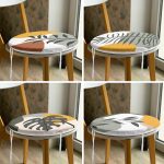 4'lü Beyaz Zemin Üzerinde Renkli Yaprak Desenli Modern Yuvarlak Fermuarlı Sandalye Minderi Seti Realhomes